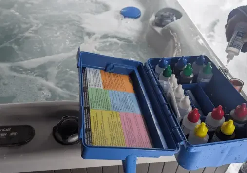 Water test kit beside a hot tub.